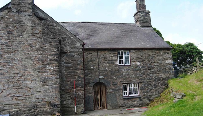 Stone built house with slate roof